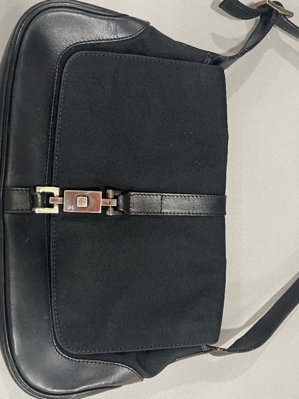 Gucci Small Black Handbag with Nickel Hardware.